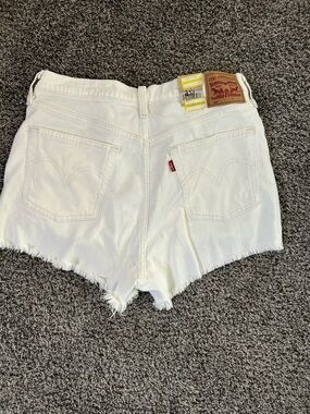 Levi's White Denim Frayed Cutoff Shorts